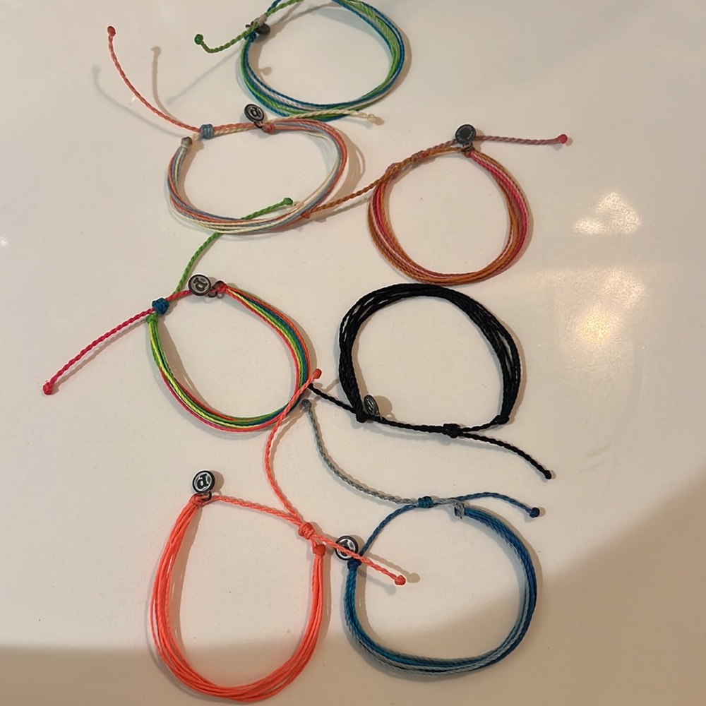 SEVEN puravida bracelets all have never been worn or worn once